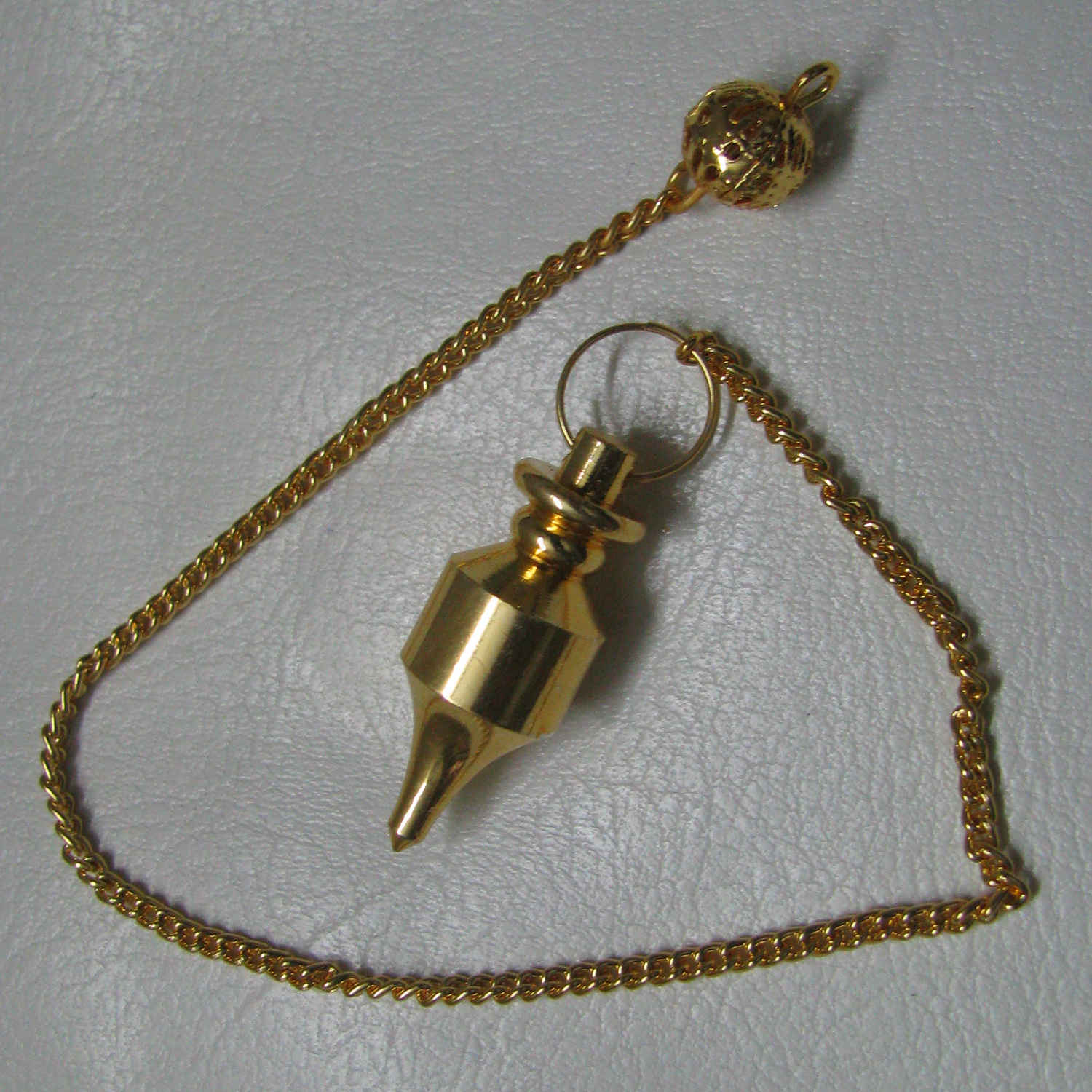 A1078-Pendulam-Dowsing-For-Divine-Direction-Metal.jpg